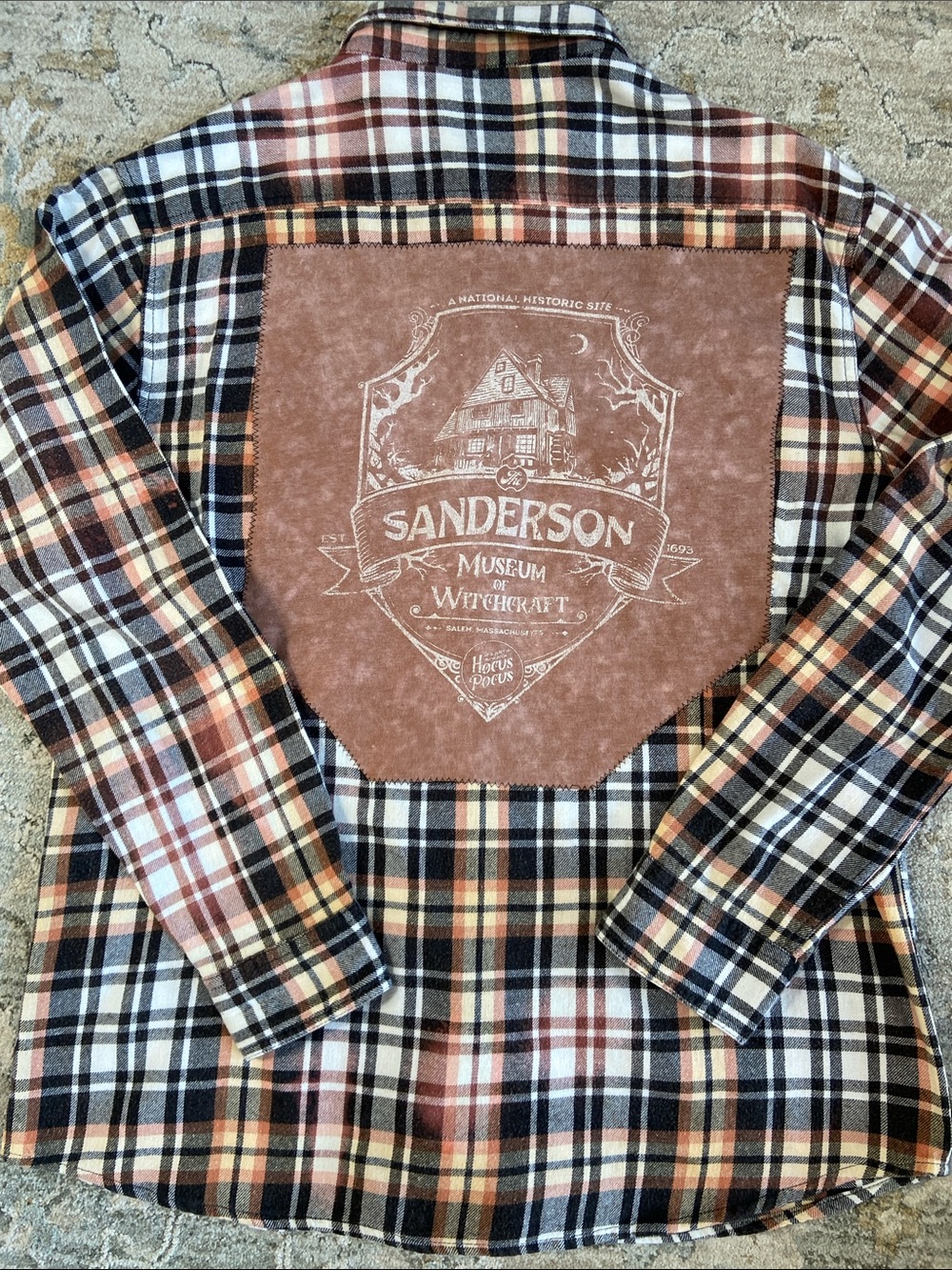 Handcrafted Distressed Flannel-Graphic Tee featuring Sanderson Witchcraft Museum